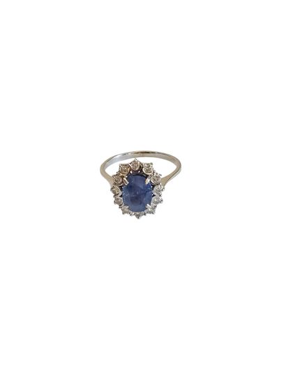 BAGUE MARGUERITE en or gris 750° ornée d'un...