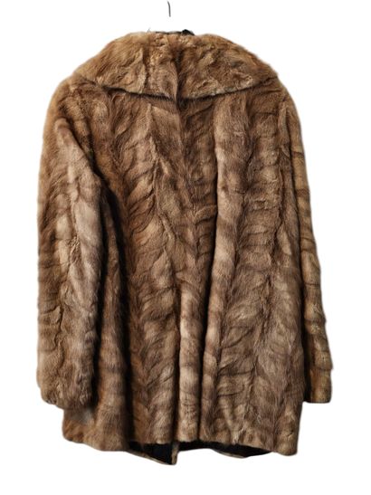 Brown mink coat
With 
An Astrakhan coat