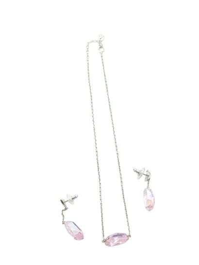 SWAROVSKI
Necklace and earrings in metal...