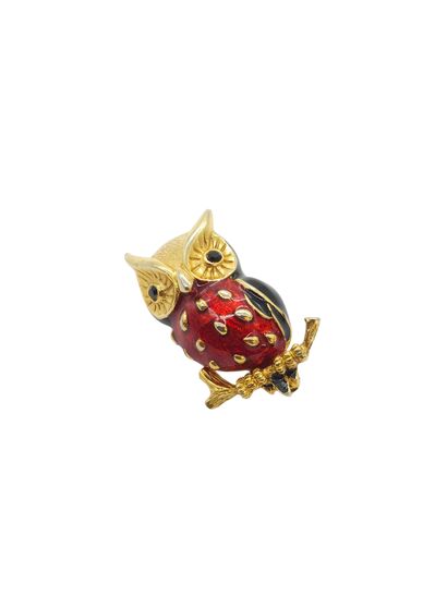 STERN 
Owl brooch in gilt metal and red and...
