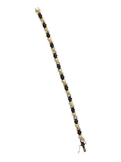 TRAVAIL MODERNE
Bracelet en or deux tons...