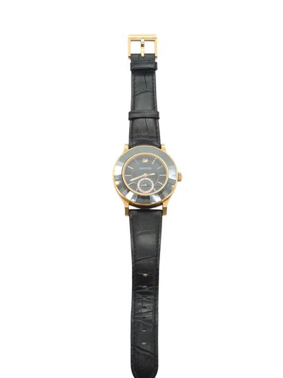 SWAROVSKI
Bracelet watch, round gold-plated...