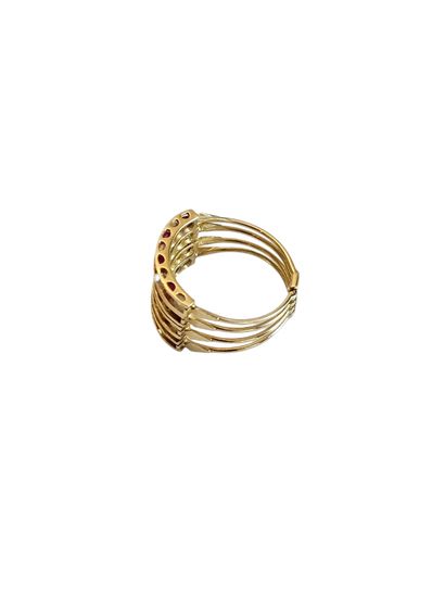 BAGUE en or jaune 750° à quatre anneaux mobiles...