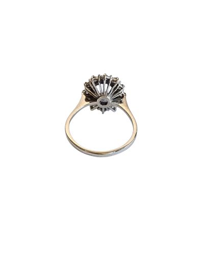 BAGUE MARGUERITE en or gris 750° ornée d'un...