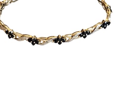 TRAVAIL MODERNE
Bracelet en or deux tons...