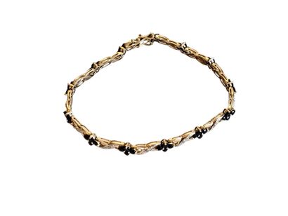 TRAVAIL MODERNE
Bracelet en or deux tons...