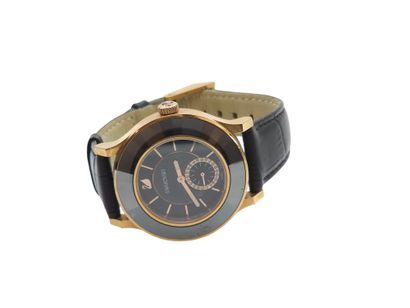 SWAROVSKI
Bracelet watch, round gold-plated...