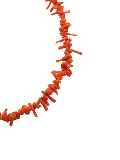 PAIR of gold-plated metal and coral ear clips
Coral...