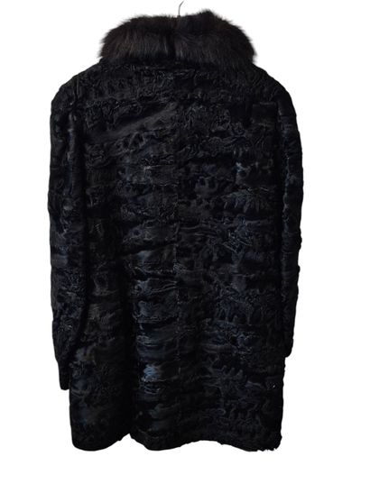 Brown mink coat
With 
An Astrakhan coat