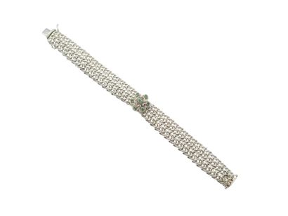 TRAVAIL ITALIEN 
Bracelet en or gris 750°...