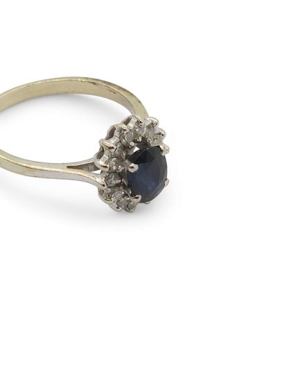 BAGUE marguerite en or gris 750° ornée d'un...