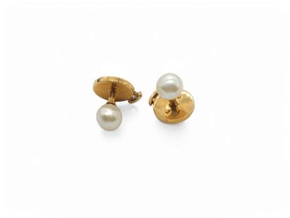 PAIRE de puce d'oreille en or jaune 750°...