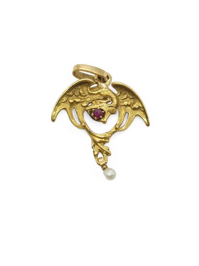 PENDENTIF en or jaune 750° figurant un dragon...