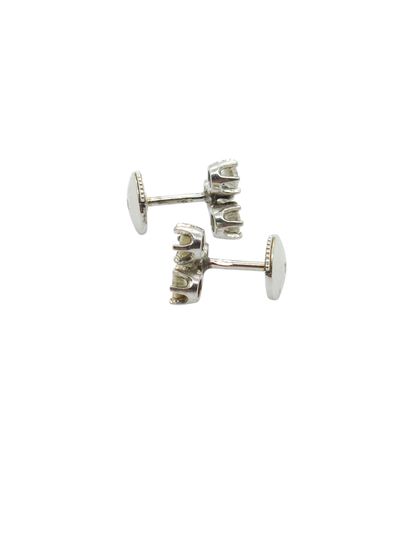 PAIRE DE BOUCLES d'oreilles en or gris 750°...