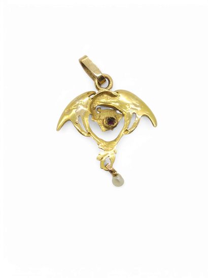 PENDENTIF en or jaune 750° figurant un dragon...