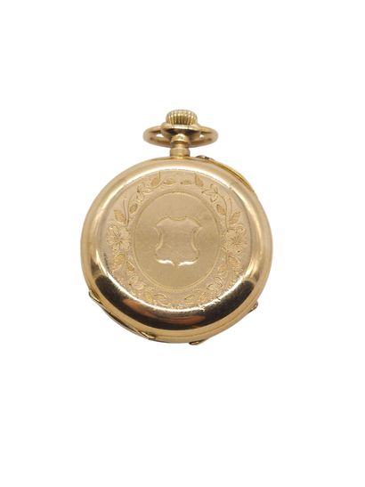 MONTRE de col en or jaune 750°, cadran blanc...
