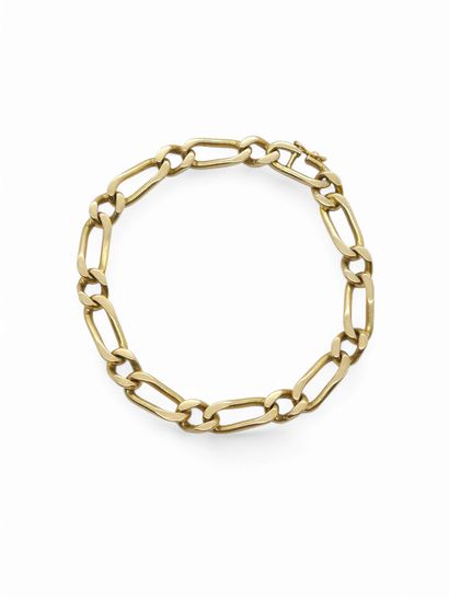 BRACELET maille gourmette en or jaune 750°...