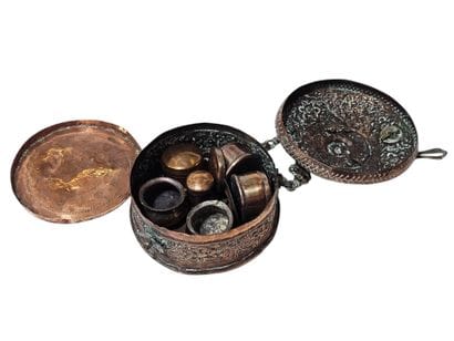 North African work
Copper doll set