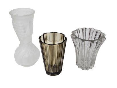 Set of molded glass vases
Including three...