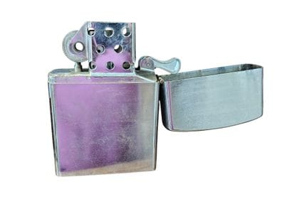 Twenty-first century work 
Metal lighter...