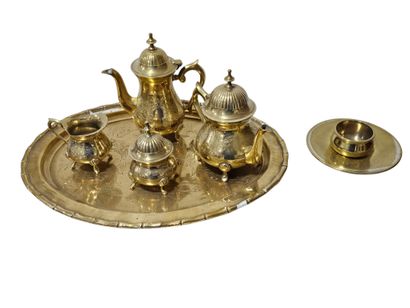 Gilded metal coffee set including: a tray,...