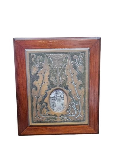 WORK OF THE TENTH CENTURY 
Photo frame in...