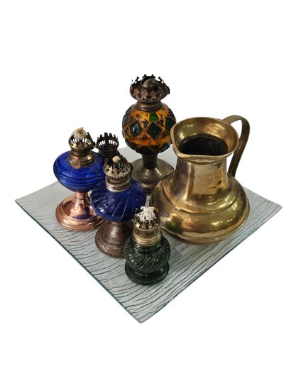 Set of small oil lamps 
One encloses 
A brass...