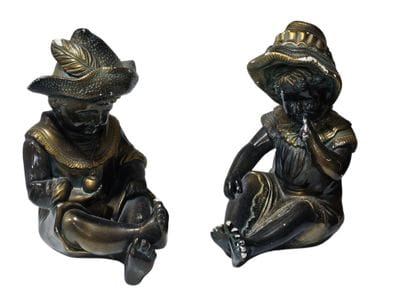 Two plaster statues representing 
A young...