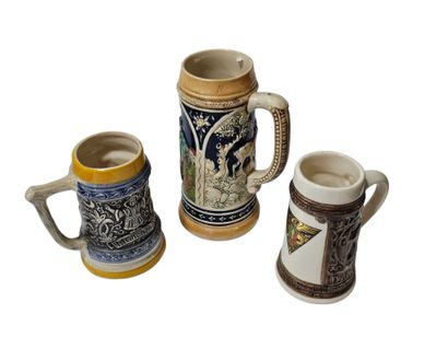 Alsatian work
Three earthenware beer mug...