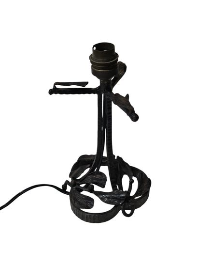 Reunion of two lamp bases in wrought iron...