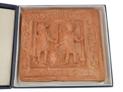 A terracotta-style plaque
A medieval sce...