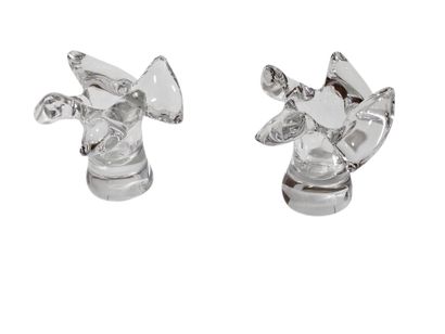 Pair of flower-shaped glass candlesticks