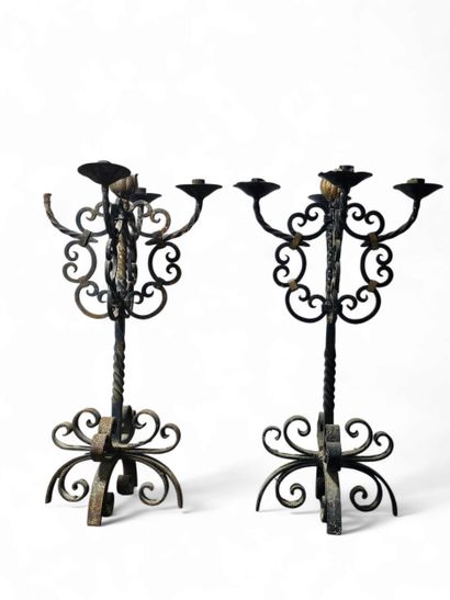 Paire de candelabre en fer forgé à quatre...
