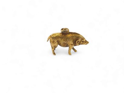 A boar pendant in 750° yellow gold
Gross...