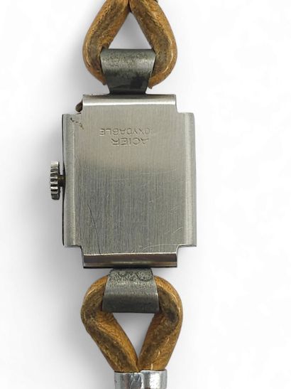 HUMA 761
Wristwatch, square steel case, copper...