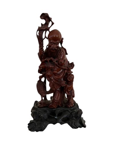 CHINA Xxth century
Sage and child in carved...