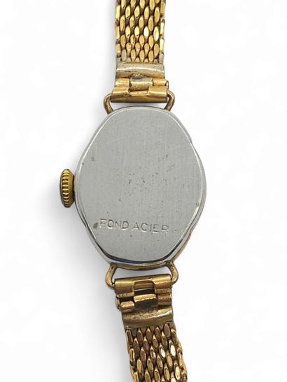 CELLY
Gilt metal wristwatch, round case,...