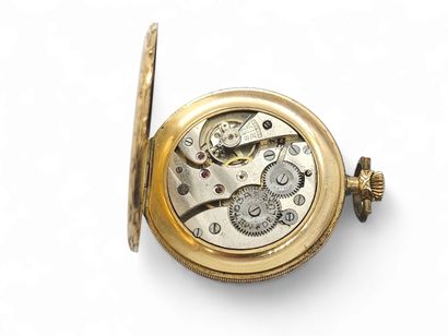 METODA
Gilt metal gousset watch, cream background...