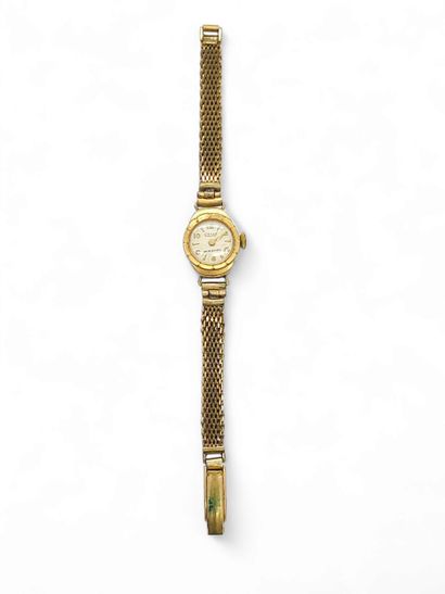 CELLY
Gilt metal wristwatch, round case,...