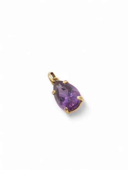 PENDANT in 750° yellow gold adorned with...
