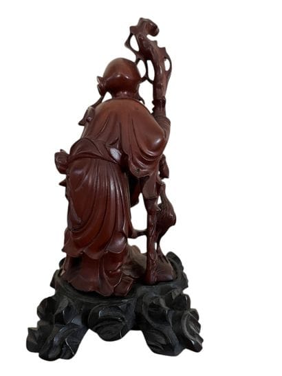 CHINA Xxth century
Sage and child in carved...
