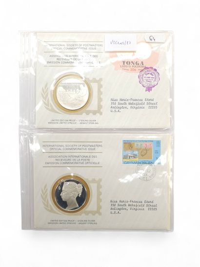 TWO COMMEMORATIVE SETS, each comprising a...