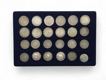 SET of silver coins including 24 compartments...