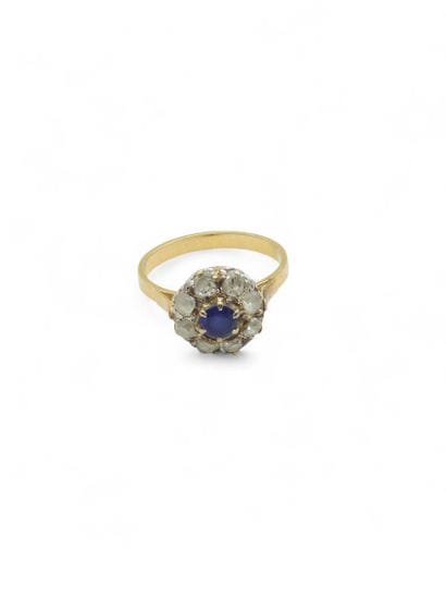 BAGUE marguerite en or deux tons 750° ornée...