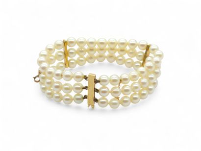 BRACELET with three strands of cultured pearls,...