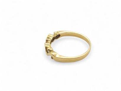 BAGUE type demi-alliance en or jaune 750°...