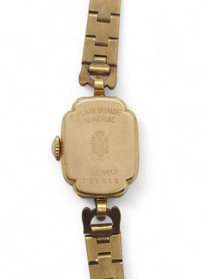 LIP
Gilt metal wristwatch, square case, cream...