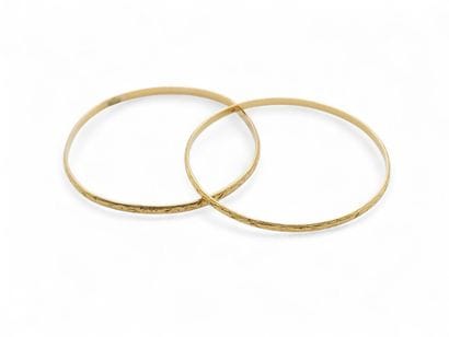 TRAVAIL ETRANGER moderne
DEUX bracelets jonc...