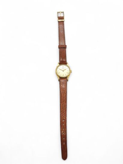 TISSOT
Brown leather wristwatch with gilt...