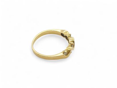 BAGUE type demi-alliance en or jaune 750°...